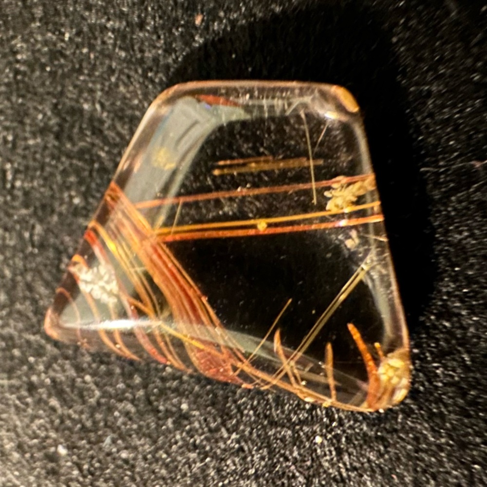 Rutilated quartz cabochon in unique shape cut